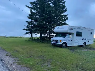 2005 Travelaire TC250, 25 ft Class C on a Ford E450 chassis with the 6.0L Power Stroke Diesel V8. On...