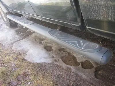 Truck step bar from a 2003 Ford Ranger, one only, (driver's side). With brackets to attach underneat...