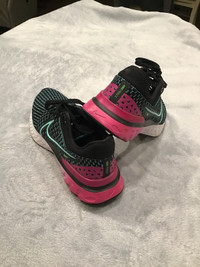 Women’s 8.5 Nike professional running shoes.Over $200 new.