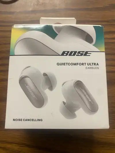 Brand new, Noise cancelling earbuds. Includes charging case. Light beige colour.