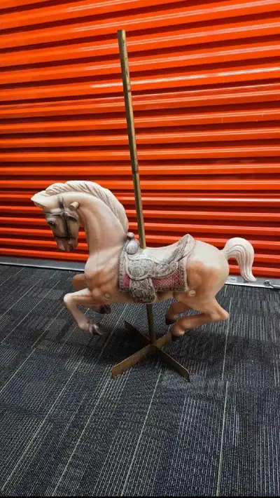 2 full size coursel horses one is a little heavier then the other due to bring brass asking $250 eac...