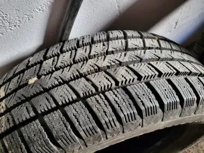 Set of four tires, no rims, less than 10,000km. Goodyear Winter Command $125 each