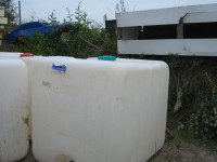 LARGE PLASTIC WATER STORAGE TOTES - In NEWCASTLE