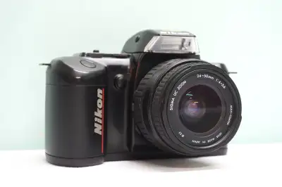 Nikon F-401 film SLR camera w/Sigma AF zoom lens – Made in Japan, View more