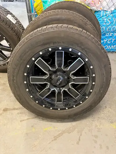 Four Michelin X-Ice snow tires with alloy rims, with programable TPMS valves installed includes lug...