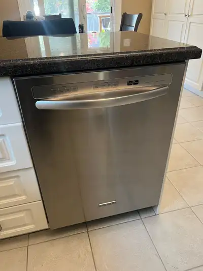 This is a KitchenAid dishwasher with a stainless steel finish, offering multiple wash cycles and opt...