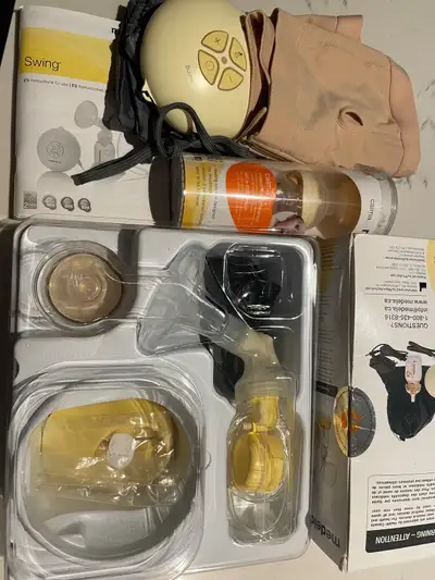 Medela breast pump with pumping bra, View more