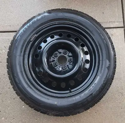 ROVELO Witer tire & metal rim. used it for one season last winter. Almost new one. With 2013 ford ed...