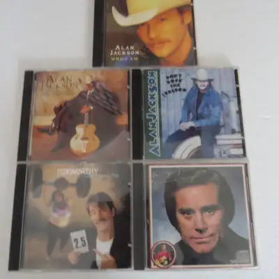 Alan Jackson - Who I AM. Alan Jackson - The Greatest Hits Collection. Alan Jackson - Don't Rock The...