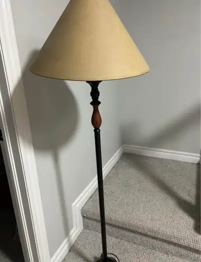 Black metal floor lamp with beige shade, View more