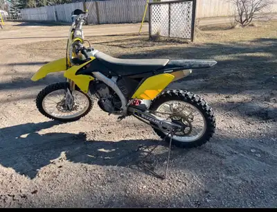 Up for sale is my 2015 Suzuki RMZ 250, a high-performance dirt bike ready for the trails or track. T...