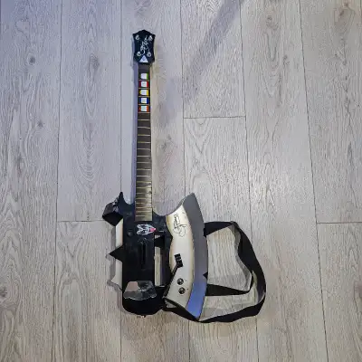 I'm selling this Wii KISS Gene Simmons Wireless Axe Guitar. It's compatible with all guitar hero gam...