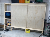 Garage cabinet with sliding doors