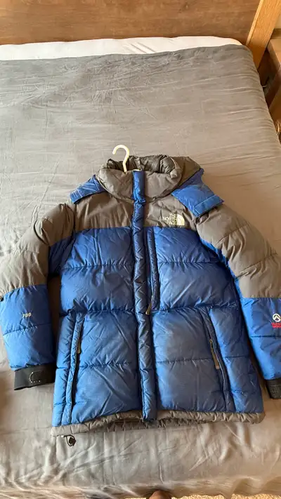 Selling a North Face Retro Jacket, perfect for staying warm during the colder months. This jacket fe...