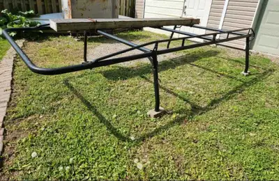 This heavy-duty ladder rack is in used condition but ready for work. Will fit truck with an 8ft bed....