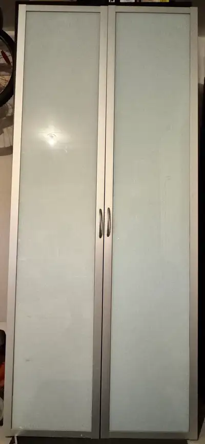 IKEA Pax Drammen doors only, selling pair. The doors feature a sleek, modern design with frosted gla...