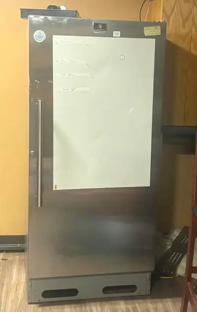 Kelvinator commercial single-door upright freezer for sale. Stainless steel exterior, spacious inter...