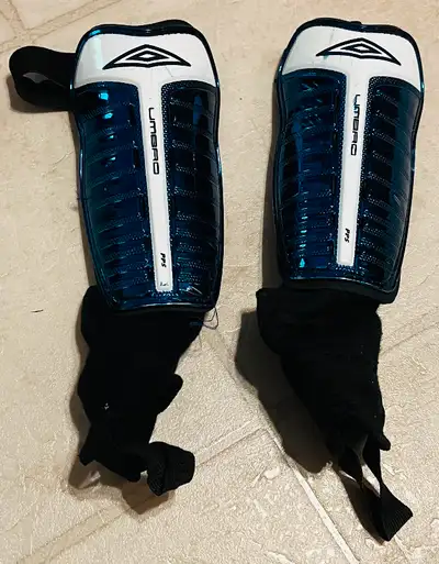 Kids large soccer shin pads in great condition.