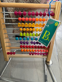 Wooden fruit shaped abacus $25, storage table $45 used 