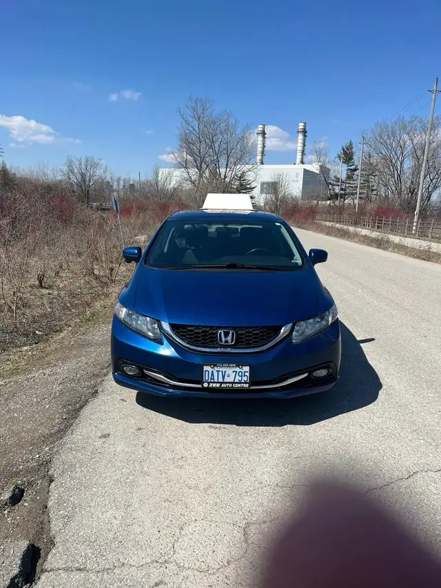 Driving lessons and road test566525081011496962