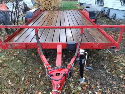 OBO/TRADES Trailer deck is 18 foot 83inch between fenders ramps are 7 foot long steel and has a good...
