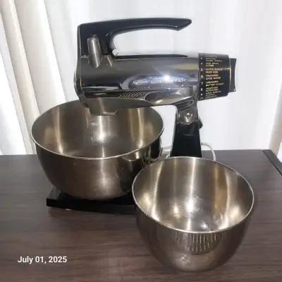 This vintage Sunbeam 12-speed mixer is all original except for the electrical cord. Comes with 2 bow...