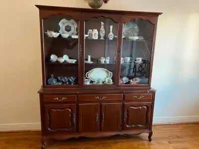 Buffet curio 63” wide x 18” deep x 72” high Asking $700 originally Top glass curio can be removed fr...
