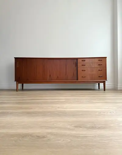 Mid-century teak veneer credenza / buffet. Structurally sound, visually minor signs of wear. Note on...