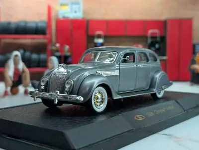I'm offering a detailed 1936 Chrysler Airflow scale model car, a true testament to classic automotiv...
