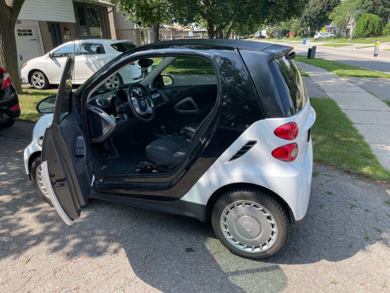 2015 Smart Car. White smart car with 96546kms. Safety included Cars