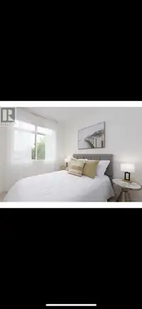 Furnished bedroom with private bathroom