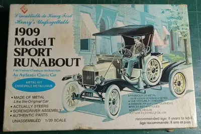 Selling a 1976 die cast model kit of a 1909 Ford Model T Sport Runabout. Complete original sealed ba...