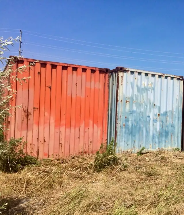 2 Large Metal Shipping Containers, Both 40’ Long