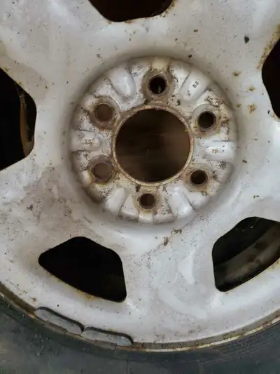 Two year old Cooper winters that barely touched the road. Second vehicle that I just scraped....3500...