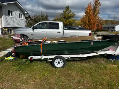 12’ fiber glass boat with motor and tailer, don’t know much about the motor, boat floats had it in w...