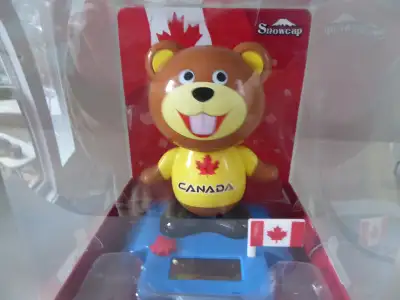 NEW IN BOX Solar Powered bobble head, no battery needed, just expose to the sun or under the lights....