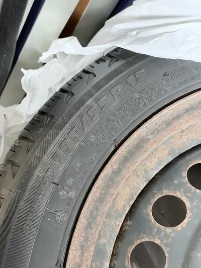 I'm selling a set of four Michelin winter tires, size 185/55R15, that are currently mounted on steel...