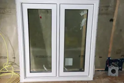 New , white double casement 36" X 40" window with triple glaze glass and siding brick moulding with...