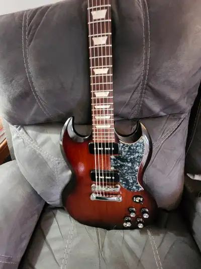 Gibson SG special 50,s tribute which is geared to the neck of 50s LP ,I dont think SG came out until...