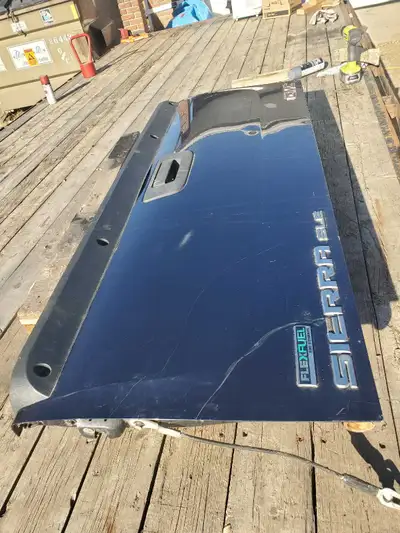 The tailgate is in good condition has a few scratches and a rock chip. No dents and it is not rusty...