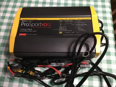 ProSport HD 12 amp battery charger, 2 bank on-board marine battery charger. Never used. Comes with b...
