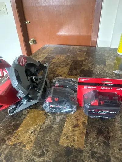 Milwaukee batteries n skill saw, View more