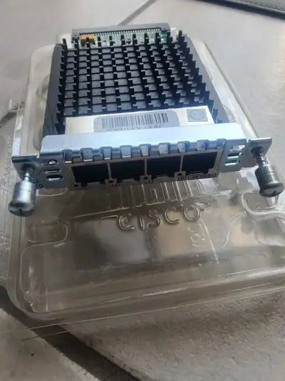 NEW Cisco 4 port network module, Tested and is fully functional.