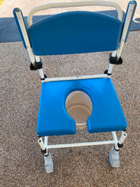 Aluminum  comode/ shower chair on 5 inch wheels