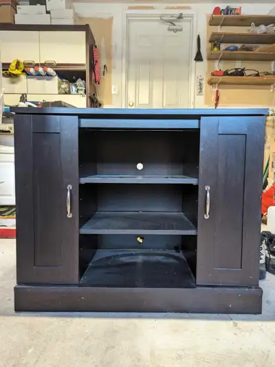 Dark brown wooden tv stand with shelves