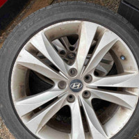 2 OEM Hyundai Genesis rims and one good tire.225/45/18 
