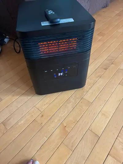 Infrared cabinet heater 1500 watts with remote- heater has different modes and timer settings. Sells...