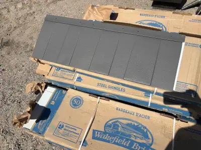 Steel roofing shingles 300 square feet. New in box