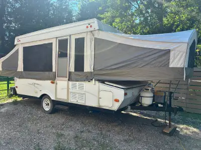 2009 12’ tent trailer with front storage box Canvas is in great shape, no holes or patches. All zipp...