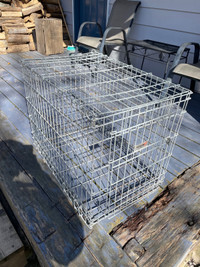 Dog cage. 30 by 24 by 20 inches 